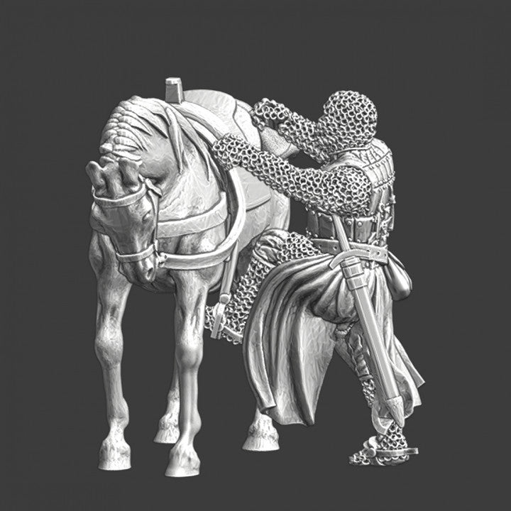 Medieval knight mounting his horse.