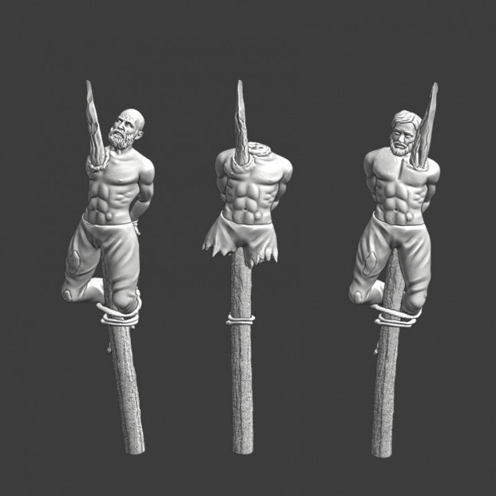 Medieval prisoners on stakes