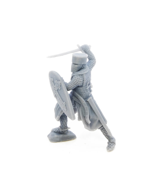 Medieval religious knight fighting with sword.